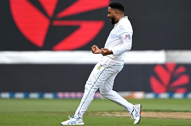 The Proteas' Dane Piedt celebrates the wicket of Kane Williamson of the New Zealand Black Caps during day two of the second Test at Seddon Park on February 14, 2024 in Hamilton, New Zealand. (Photo by Hannah Peters/Getty Images)