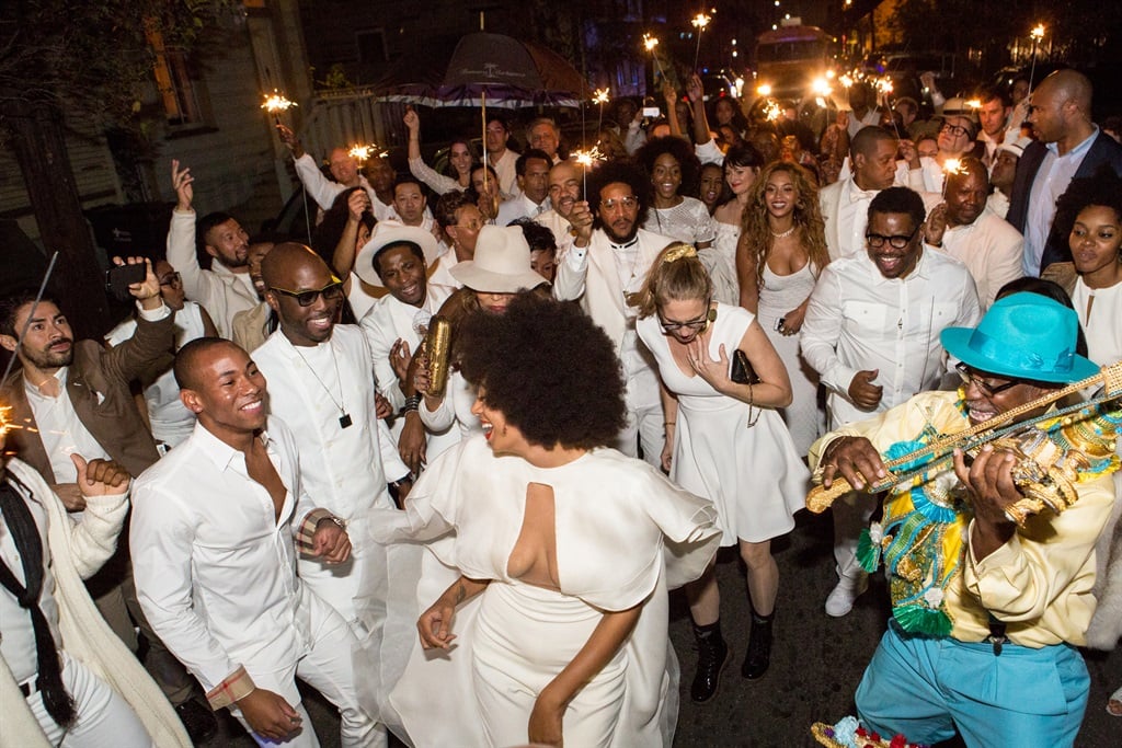 Musician Solange Knowles (C) and her new husband, music video director Alan Ferguson second line in the streets of New Orleans with family and guests after her wedding on November 16, 2014 in New Orleans, Louisiana.  (Photo by Josh Brasted/WireImage)