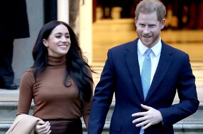 Royal gate-crashers! Prince Harry and Meghan Markle join poetry group in a surprise visit