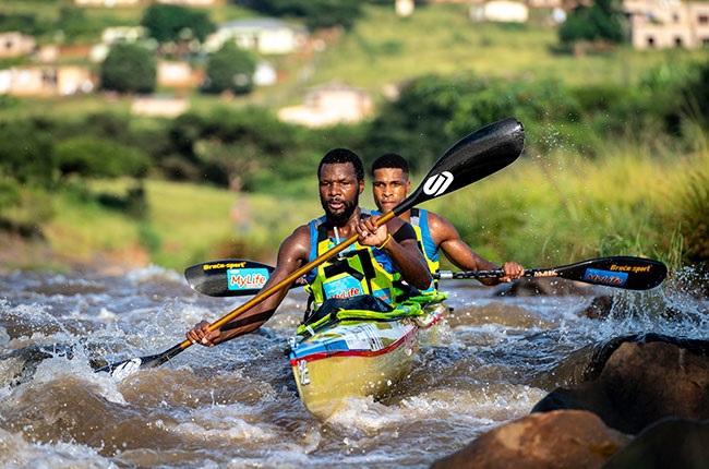 Msawenkosi Mtolo (front) and Sbonelo Khwela hold a slender lead after Day 1 of the Dusi Canoe Marathon. (Photo by Ant Grote /
Gameplan Media)