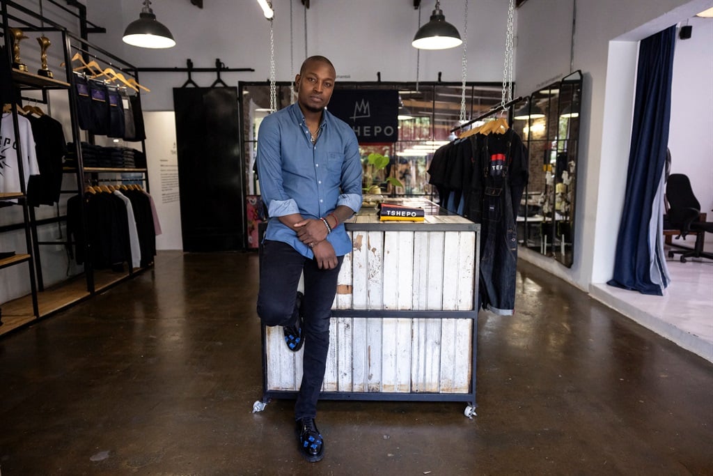 Tshepo Mohlala, founder of Tshepo Jeans, poses for