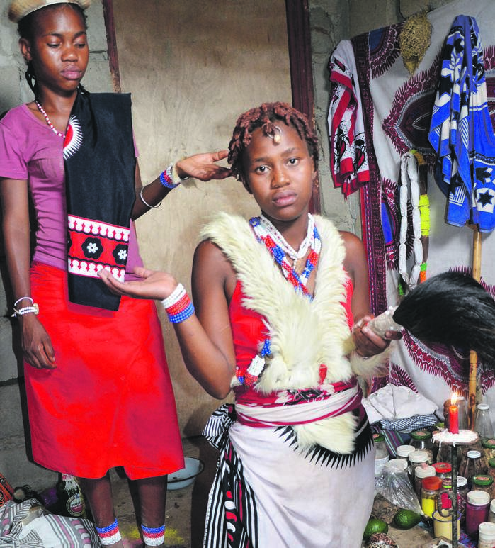 MOVING ON: Thwasa Jabulile Dube with her gobela Trust Mathebula (standing).  Photo by Oris Mnisi