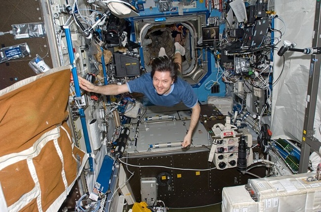 Oleg Kononenko on the International Space Station on his first of many missions to this engineering and research laboratory in orbit around the Earth. (PHOTO: Creative Commons/NASA)