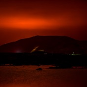 Icelandic volcano erupts, lighting up night sky near Reykjavik