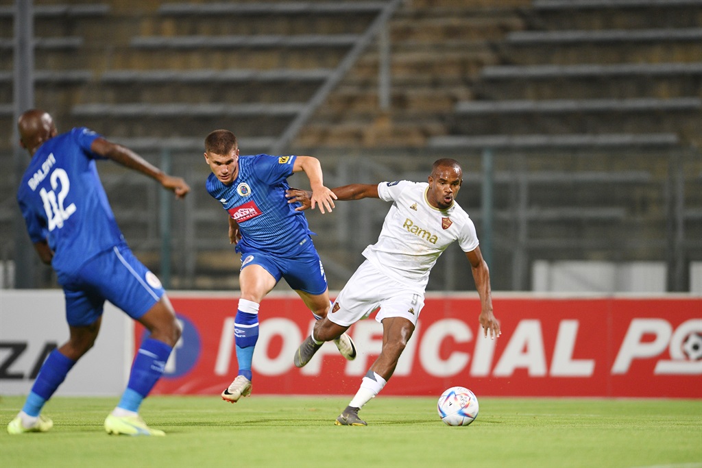 PRETORIA, SOUTH AFRICA - FEBRUARY 16:  Keegan Allan of SuperSport United and Iqraam Rayners of Stellenbosch FC during the DStv Premiership match between SuperSport United and Stellenbosch FC at Lucas Moripe Stadium on February 16, 2024 in Pretoria, South Africa. (Photo by Lefty Shivambu/Gallo Images)