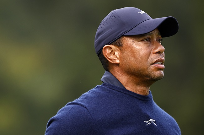 Sport | Ailing Woods 'feeling better' after flu forced him out at Riviera