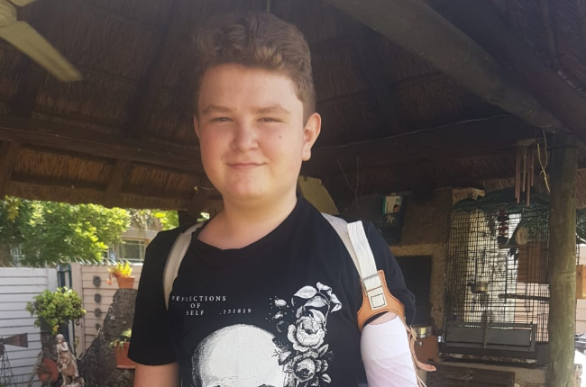15-year-old Carl Meiring is overjoyed with his new prosthetic arm. (Photo: Supplied)
