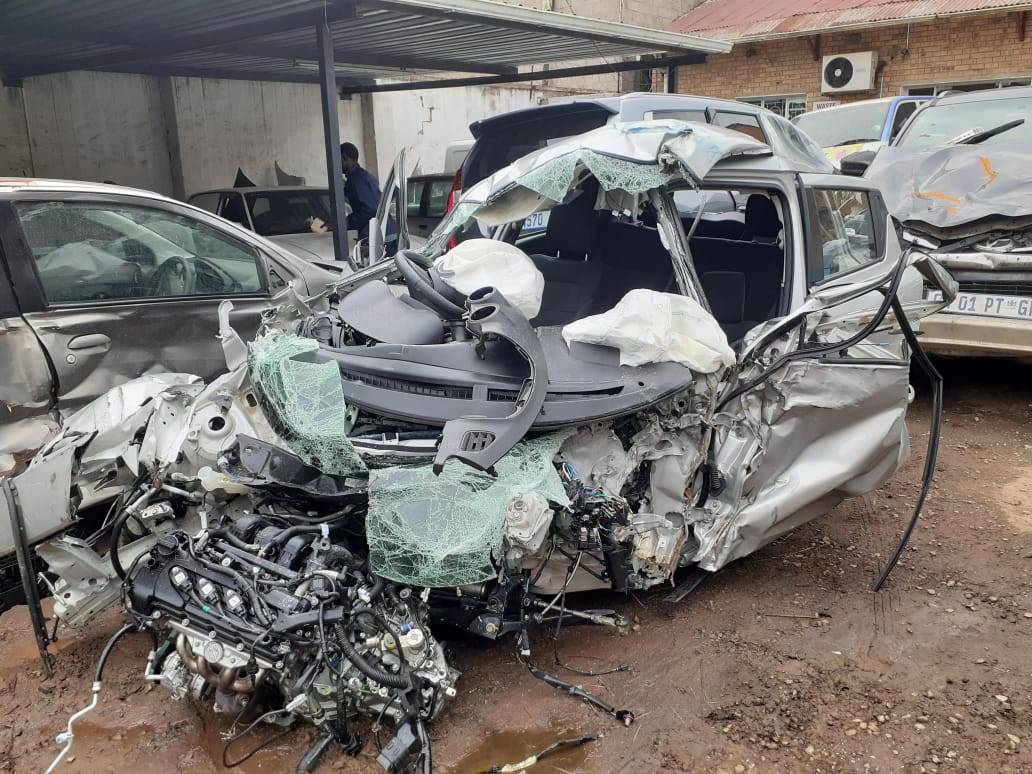 The crumpled remains of a silver Suzuki which was hit by a truck and trailer on Tuesday morning. The driver and his 14-year-old daughter were both injured, with the teenager said to be in a critical condition.