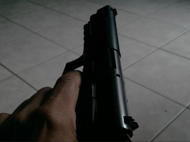 A person holding a gun
