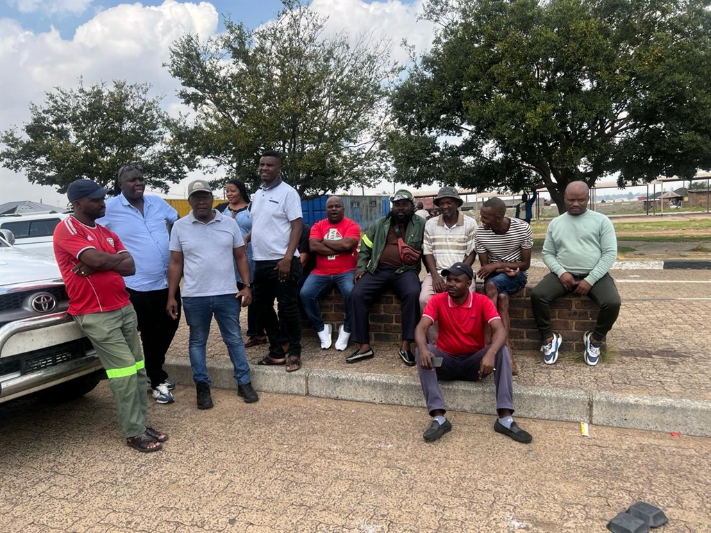 Former Optimum coal mine workers are excited that the ex-Gupta-owned mine will start operating again. Photo by Bulelwa Ginindza 