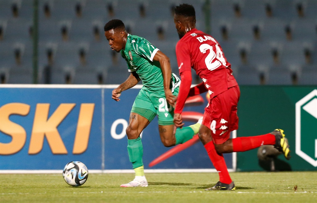 JOHANNESBURG, SOUTH AFRICA - FEBRUARY 21: Moses Dlamini of Highlands Park in action with Thamsanqa Masiya of Sekhukhune United during the Nedbank Cup, Last 32 match between Highlands Park and Sekhukhune United at Dobsonville Stadium on February 21, 2024 in Johannesburg, South Africa. (Photo by Gallo Images)