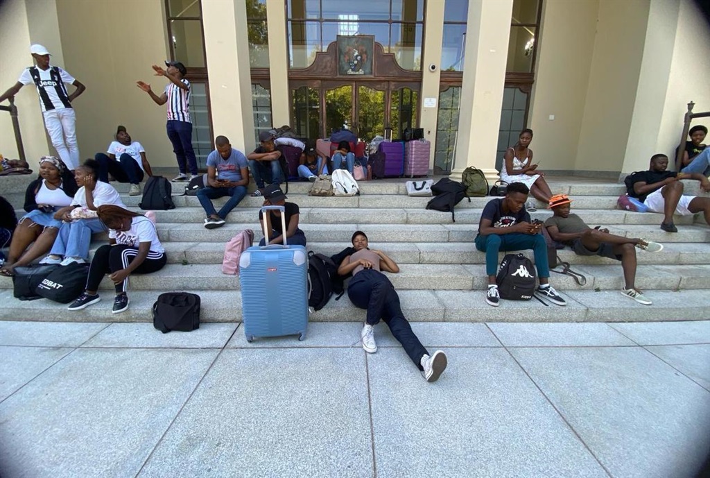 Students from Stellenbosch University slept outside the admin building along with their luggage.