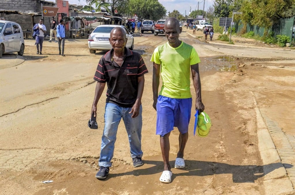 Samuel Thabethe and Titus Sgudla are worried about crime in their kasi. Photo by Raymond Morare 