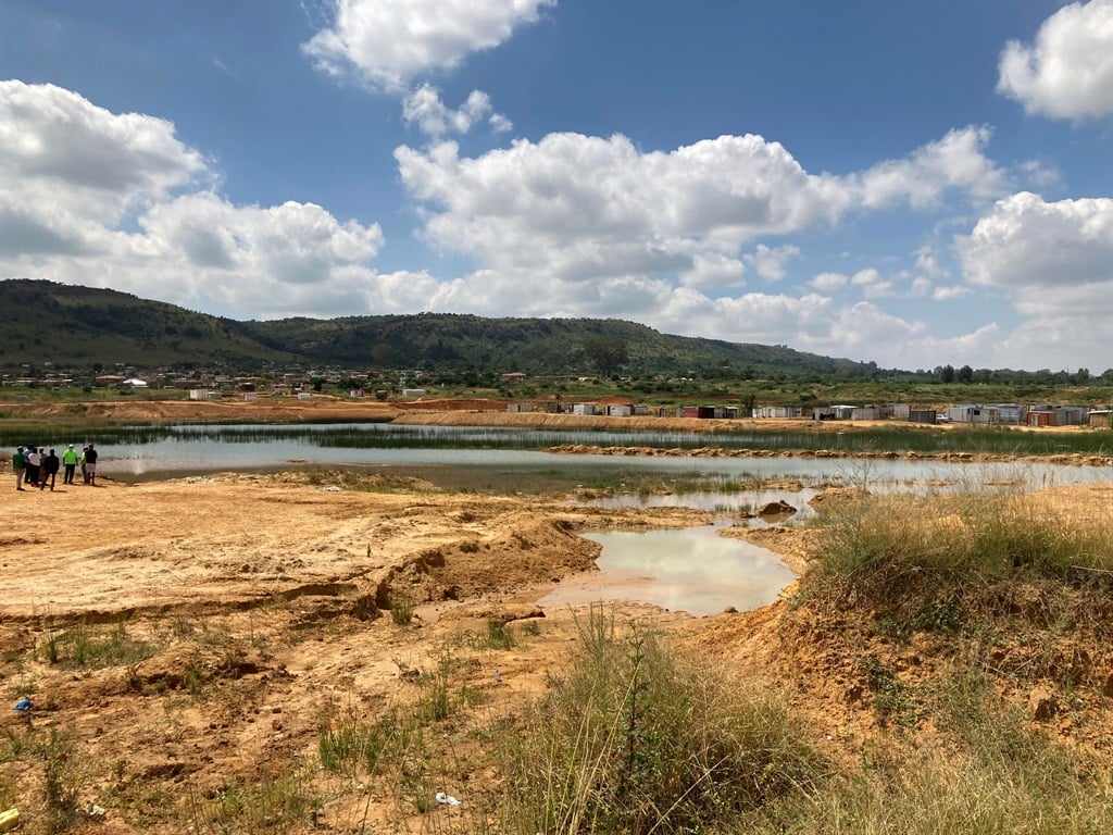 The water-filled quarry in the quarry in Kopanong Pienaarspoort informal settlement near Mamelodi where two young boys drowned. 