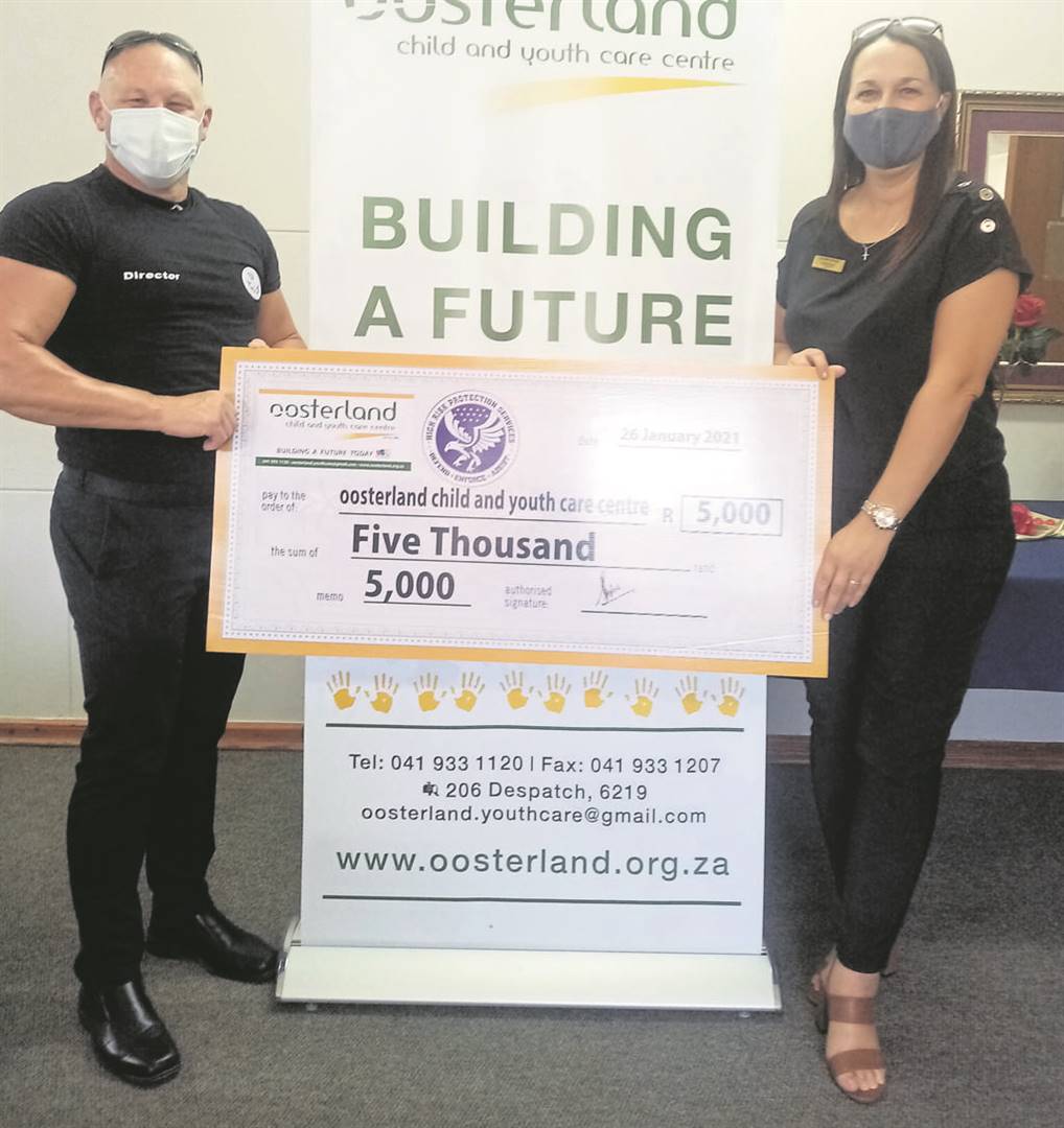 RIGHT: High Risk Protection Services donated R5 000 towards the Oosterland Child and Youth Centre fence project and now challenges other businesses also to contribute. Seen above are Silvano Recchia, Director of High Risk Protection Services and Annelie Morton, fundraiser at Oosterland Child and Youth Centre.