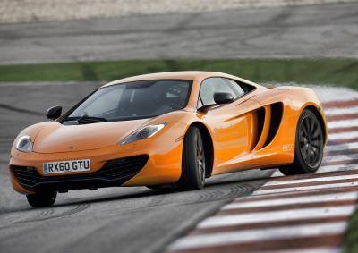 STEP OUT IN STYLE: Could this be the most finessed, predictable and forgiving compact supercar ever? Looks good in McLaren’s traditional orange hue.