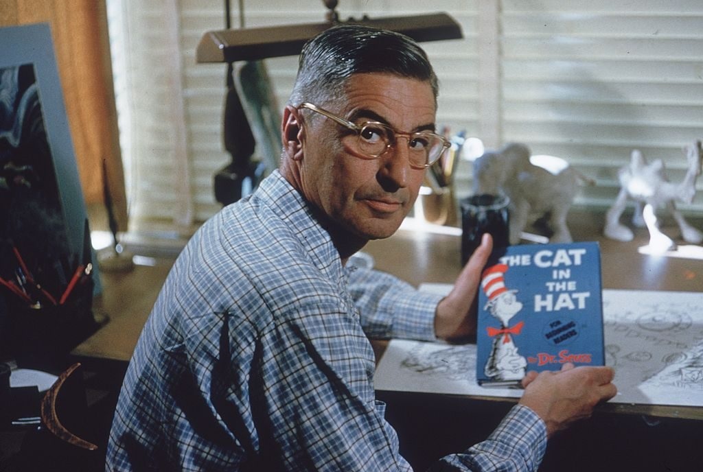 Theodor Seuss Geisel at his drafting table in his home office, La Jolla, California, April 25, 1957. (Photo by Gene Lester/Getty Images.)
