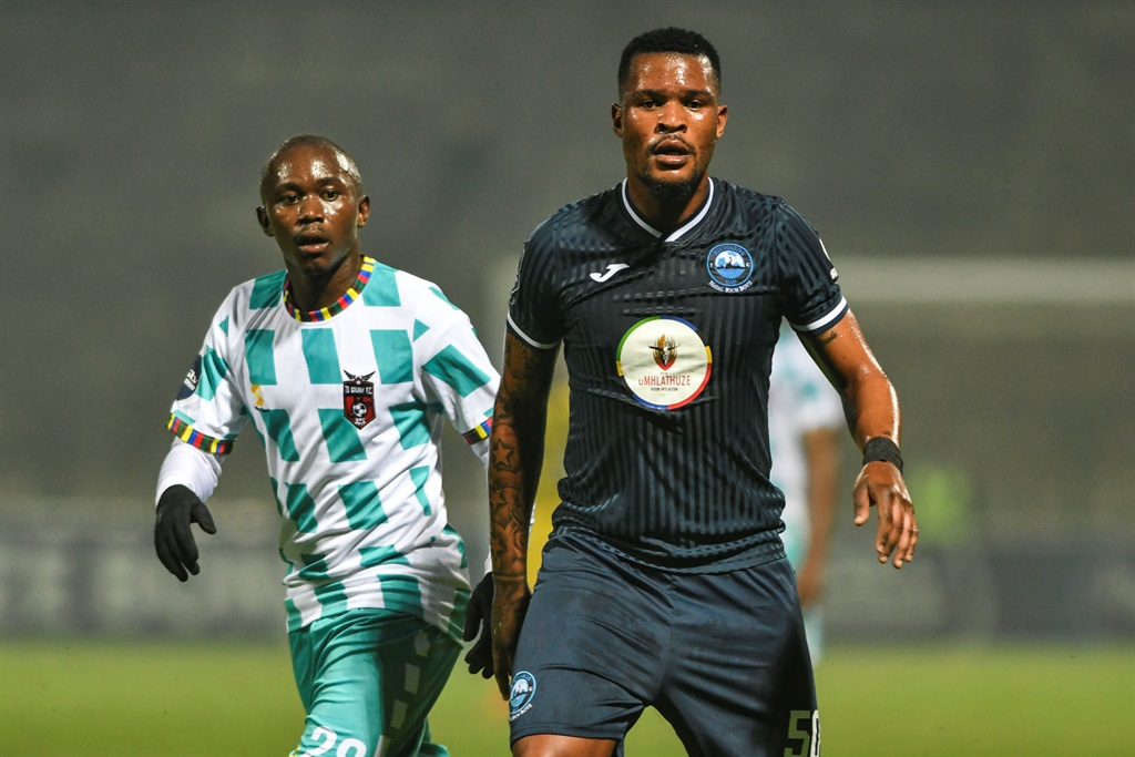 DURBAN, SOUTH AFRICA - SEPTEMBER 18: Masilake Phohlongo of TS Galaxy FC and Nkanyiso Zungu of Richards Bay FC during the DStv Premiership match between Richards Bay and TS Galaxy at King Zwelithini Stadium on September 18, 2022 in Durban, South Africa. (Photo by Darren Stewart/Gallo Images)