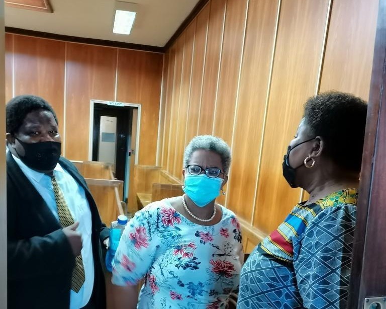 Axed Eastern Cape health MEC Sindiswa Gomba (right) chatting to co-accused Zukiswa Ncitha who is the former mayor of Buffalo City Metro, and their lawyer Advocate Michael Maseti. (Photo: Malibongwe Dayimani/News24)