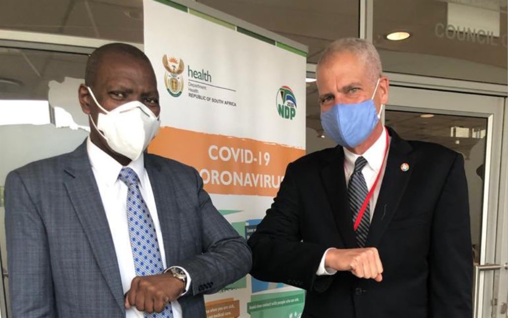 US chargé d'affaires Todd Haskell and Health Minister Zweli Mkhize 