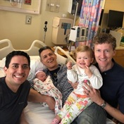 Three dads and a baby! A trio of fathers is the first to be named on their kids’ birth certificates