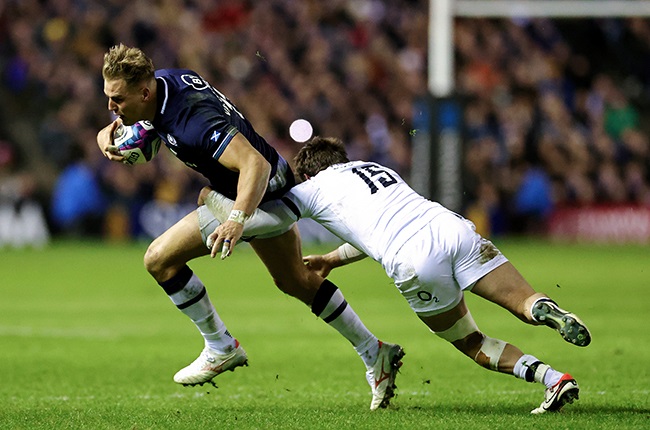 Scotland's Duhan van der Merwe takes on England's George Furbank during the Six Nations match at  Murrayfield in Edinburgh on 24 February 2024. (Photo by David Rogers/Getty Images)