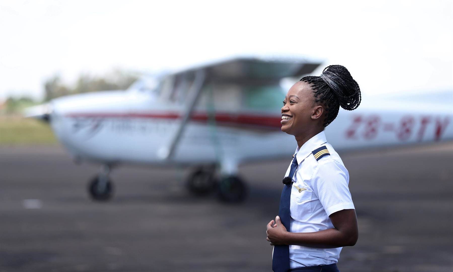 Refilwe Ledwaba, a pilot training young African women to become aircraft and drone pilots, reacts during an interview at the Grand Central airport in Midrand Picture: Siphiwe Sibeko/Reuters