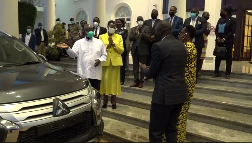 PRESIDENT MUSEVENI HANDS ONYANGO HIS CAR KEYS