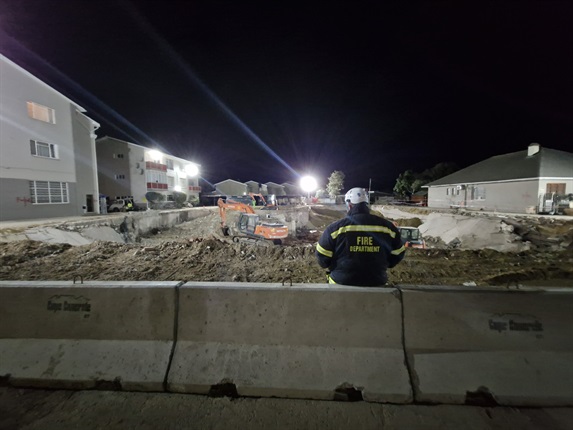 <p><strong>Number of people believed to have been trapped at building
site, revised

&nbsp;</strong>
</p><p>Rescue and recovery operations at the collapsed building
site at 75 Victoria Street in George are expected to cease on Friday. </p><p>Rescue workers and other role-players have been on site for
259 hours. </p><p>The number of people believed to have been on the site at
the time of the collapse has now been revised after the terrain was cleared and no further victims were found.
</p><p>"Based on information received from the contractor on
site, the South African Police Service and other emerging external sources, the
estimated number of individuals on site during the incident was 81. We are
aware that as the rescue operation unfolded the numbers fluctuated, however we
can now confirm that 62 individuals were either recovered or rescued which
allows for a 54.8% rescue rate," the George Municipality said. </p><p>The death toll remained at 33, while four of the victims are
yet to be identified. </p><p><em>- Nicole McCain </em></p><p><em>(Photo by the Garden Route District Municipality)</em></p>