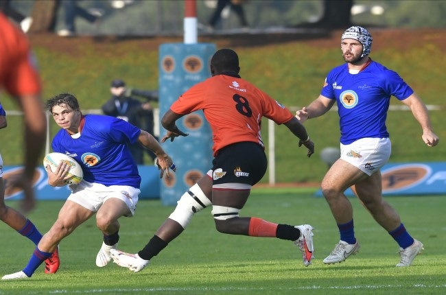 Zane Bester, left, of Shimlas with the ball during the Varsity Cup match between UJ and Shimlas at UJ Stadium in Johannesburg on Monday. (Photo by Sydney Seshibedi/Gallo Images)