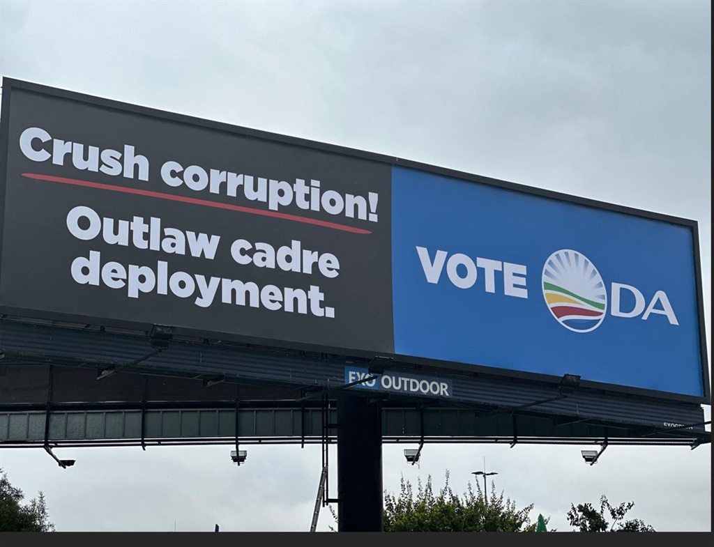 DA unveils new billboard against cadre deployment.