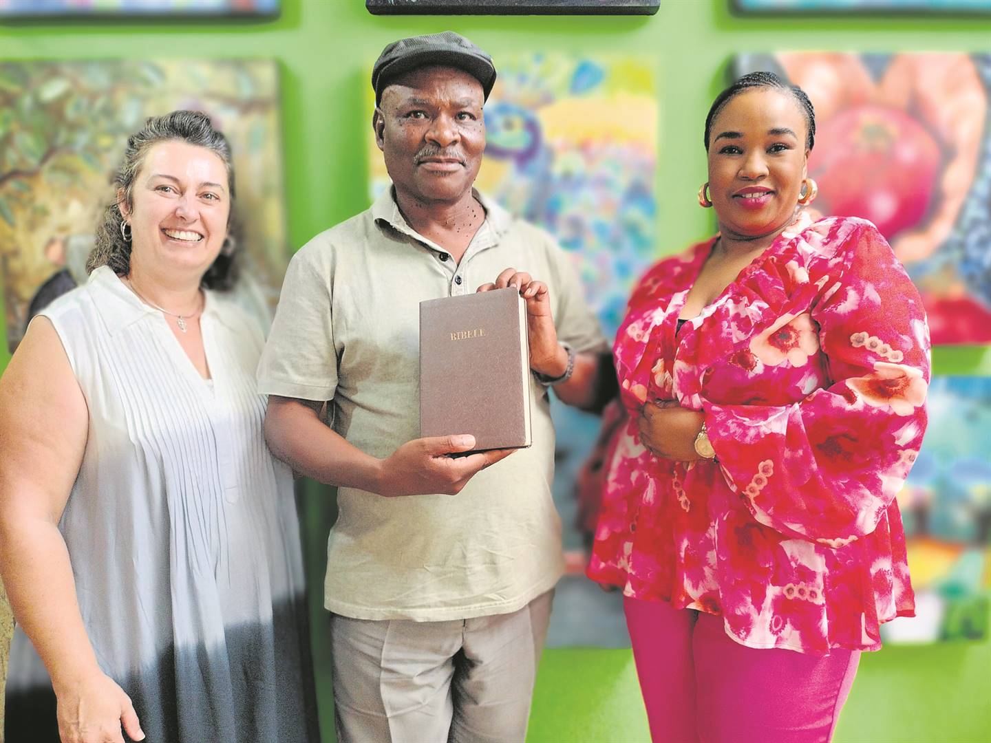 From the left are Dr Elrika Senekal Van der Berg (team leader in the central region of the Bible Society of South Africa), Past. Ishmael Notzi (recipient) and Stella Moletsane (sales representative of the society).Photo: Lientjie Mentz