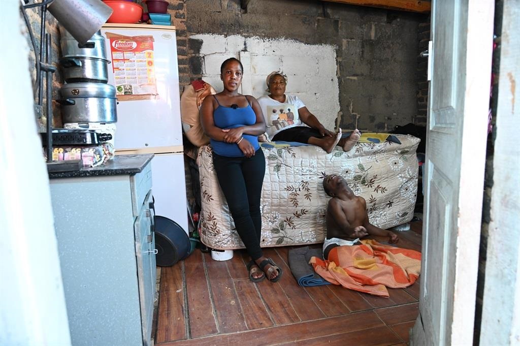 Mavis Makhaphela lives in a one-roomed house with her child, Lulama Dumile (32), who lives with a disability. Photo by Morapedi Mashashe