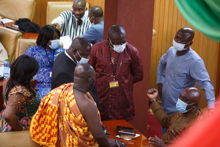 Members of Ghana’s parliament during a break from electing a new leader of parliament. Only 14% of parliamentarians are women. (Nipah Dennis/AFP via Getty Images)