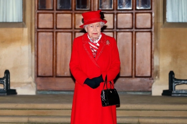 Queen Elizabeth is handling the latest royal crisis in her stoic stride and has been continuing with her duties. (PHOTO: Gallo Images/Getty Images)