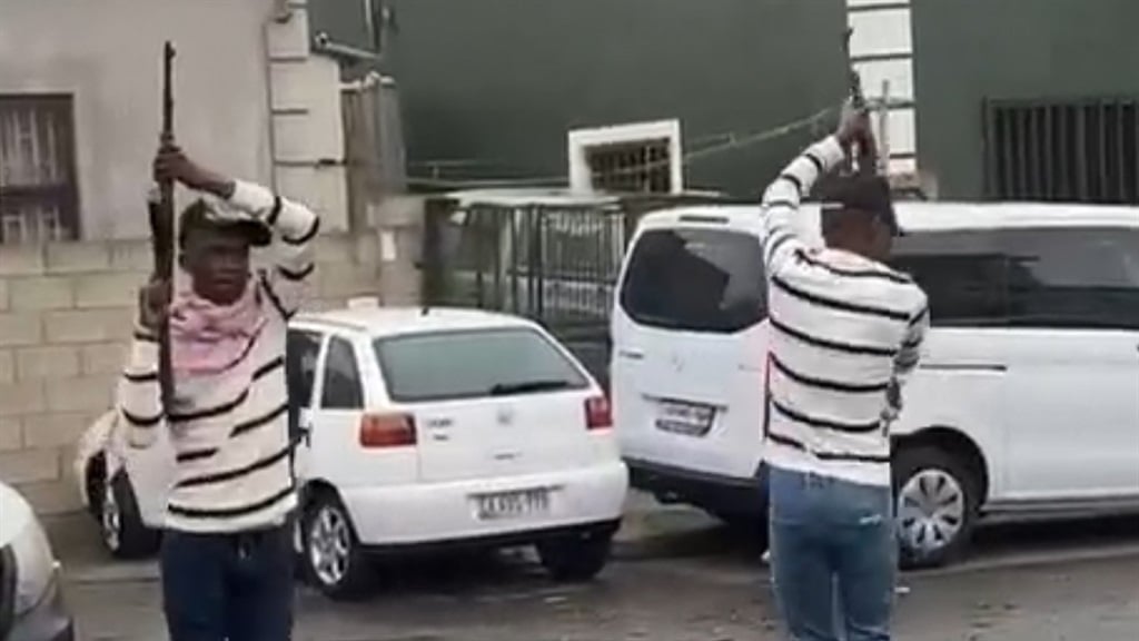 Cape Town police have found two people of interest following viral videos of men firing AK-47s on Sunday. (Screenshot)