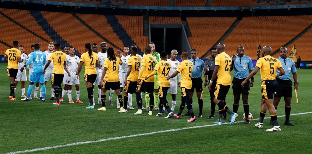 JOHANNESBURG, SOUTH AFRICA - APRIL 02: Players and officials shaking hands during the DStv Premiership match between Kaizer Chiefs and Stellenbosch FC at FNB Stadium on April 02, 2024 in Johannesburg, South Africa. (Photo by Gallo Images)