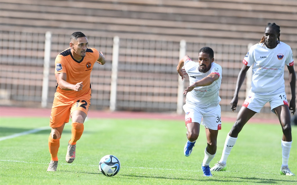 POLOKWANE, SOUTH AFRICA - MARCH 30: Cole Elexander of Polokwane City and Graig Martin of Chippa United during the DStv Premiership match between Polokwane City and Chippa United at Old Peter Mokaba Stadium on March 30, 2024 in Polokwane, South Africa. (Photo by Philip Maeta/Gallo Images)