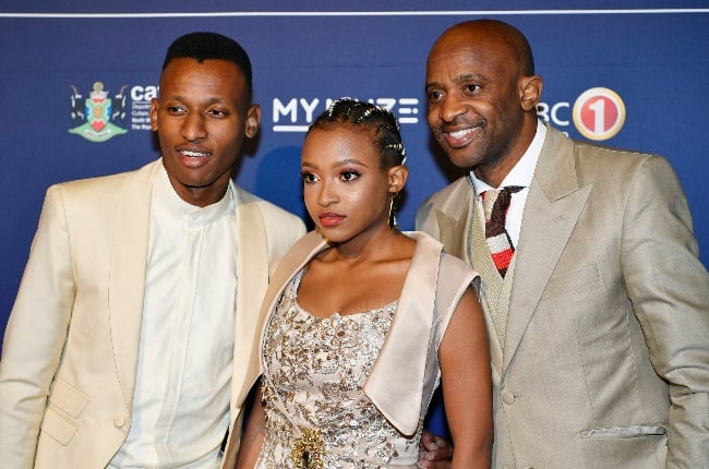 Arthur Mafokate with his children Owami and Lesego.