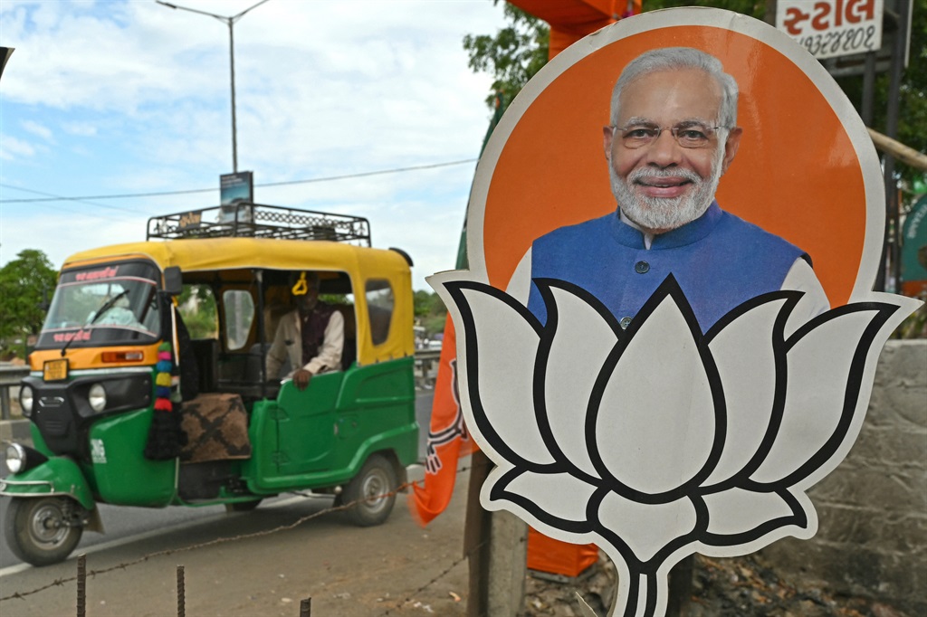 A cut-out of Indian Prime Minister Narendra Modi installed along the roadside in the Rajkot district of Gujarat state, on 5 May 2024, ahead of the third phase of voting of the country's general election. (Indranil Mukherjee / AFP)