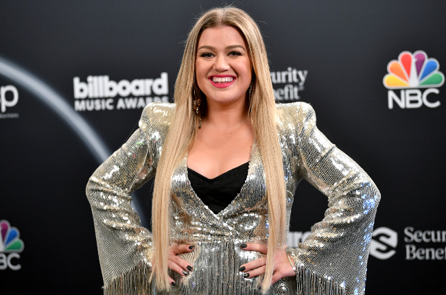 Kelly Clarkson poses backstage at the 2020 Billboard Music Awards. Photographed by Amy Sussman
