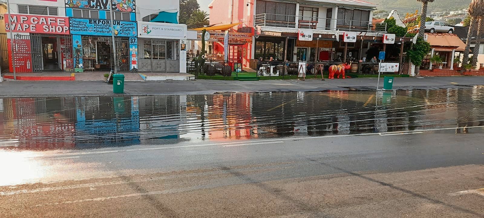Access to several businesses along Beach Road in Gordon’s Bay was restricted due to a waterlogged street following a pipe burst.