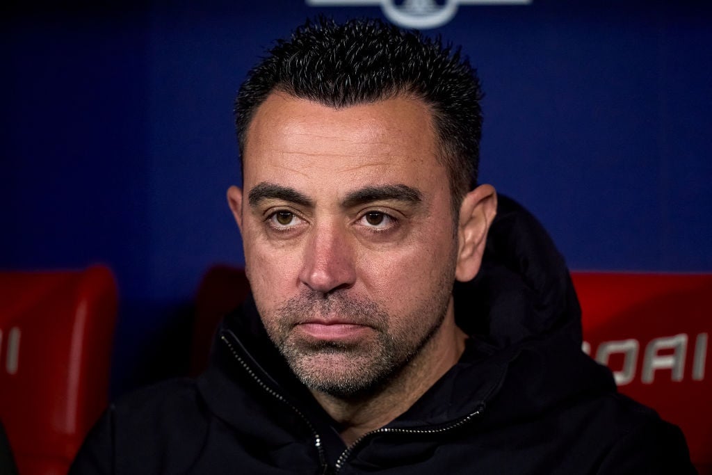 MADRID, SPAIN - MARCH 17: Xavi Hernandez head coach of FC Barcelona looks on prior the game the LaLiga EA Sports match between Atletico Madrid and FC Barcelona at Civitas Metropolitano Stadium on March 17, 2024 in Madrid, Spain. (Photo by Diego Souto/Getty Images)
