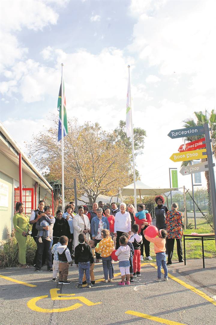 Heartlands Baby Sanctuary marked its ninth birthday with a celebratory open day and special flag-raising ceremony last Friday (3 May). Pictured are staffers who shared in the momentous occasion, which included birthday eats and treats and a fun-filled gathering with the children at the premises in Old Paardevlei Road, Somerset West. The facility was established on 4 May 2015 in response to the request of the provincial Department of Social Development to offer temporary residential safe care and support for children in need of urgent care and protection. The registered child and youth care centre and community mental health facility cares for 25 children at any given time and provides holistic care for orphaned and vulnerable children from birth to six years of age. Photo: Jamey Gordon