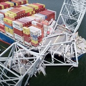 Baltimore bridge being cut up after ship collision