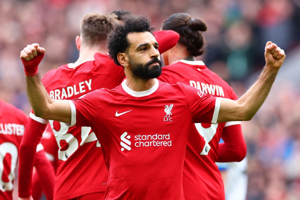 LIVERPOOL, ENGLAND - MARCH 31: Mohamed Salah of Liverpool celebrates scoring his sides second goal during the Premier League match between Liverpool FC and Brighton & Hove Albion at Anfield on March 31, 2024 in Liverpool, England. (Photo by Chris Brunskill/Fantasista/Getty Images)