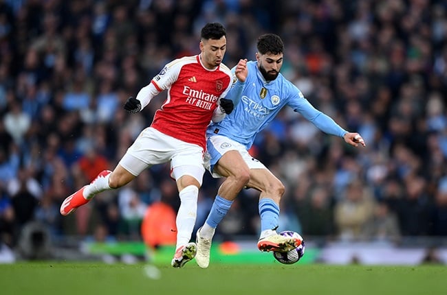 Josko Gvardiol of Manchester City (right) is challenged by Gabriel Martinelli of Arsenal (Justin Setterfield/Getty Images)