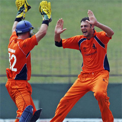 Part-timer: accountant Bernard Loots celebrates a wicket for the Netherlands. (AFP)