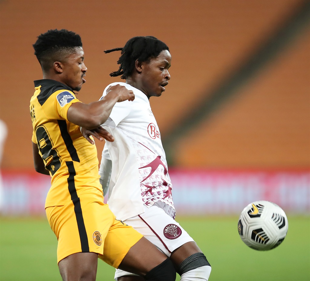 Moikhomotsi Thibedi of Swallows FC challenged by Dumisani Zuma of Kaizer Chiefs during the DStv Premiership 2020/21 match between Kaizer Chiefs and Swallows FC at FNB Stadium in Johannesburg on the 12 May 2021 Â©Muzi Ntombela/BackpagePix
