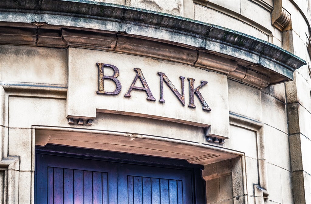 An old fashioned bank sign on the exterior of a building in Manchester, England. (George Clerk/Getty Images)